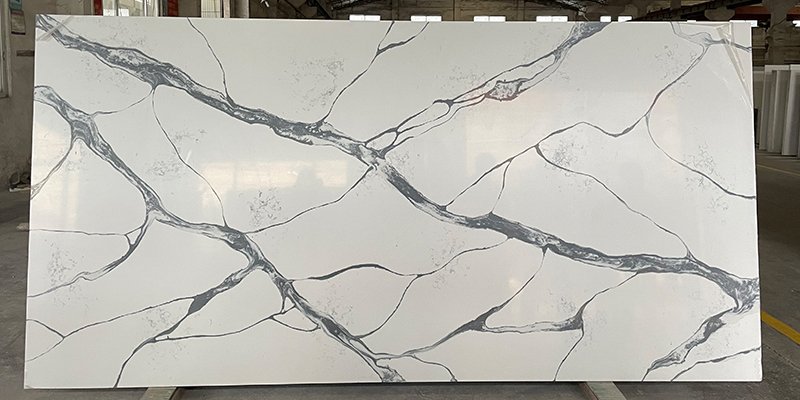 Variation in Quartz Quality Two quartz slabs side-by-side with visible differences in color and pattern