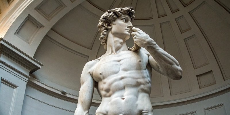 Michelangelo's David Carved from Carrara Marble A classic image of Michelangelo's David, a masterpiece carved from Carrara marble.