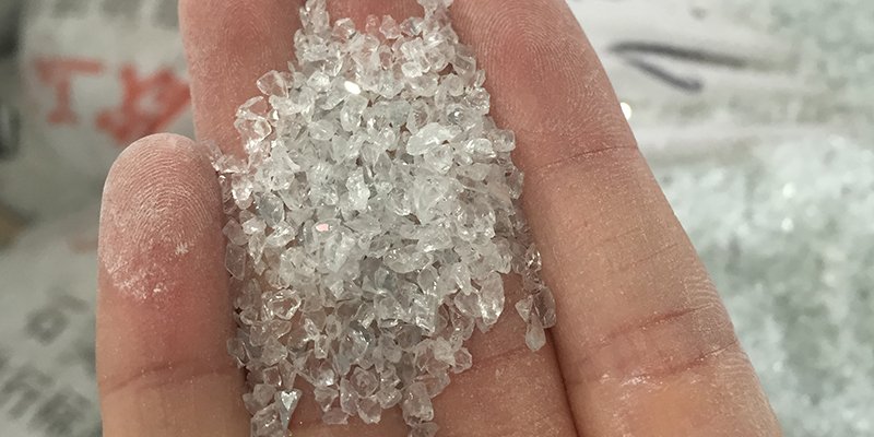 From Raw Quartz to Engineered Slab A photo of raw quartz crystals next to a finished polished slab.